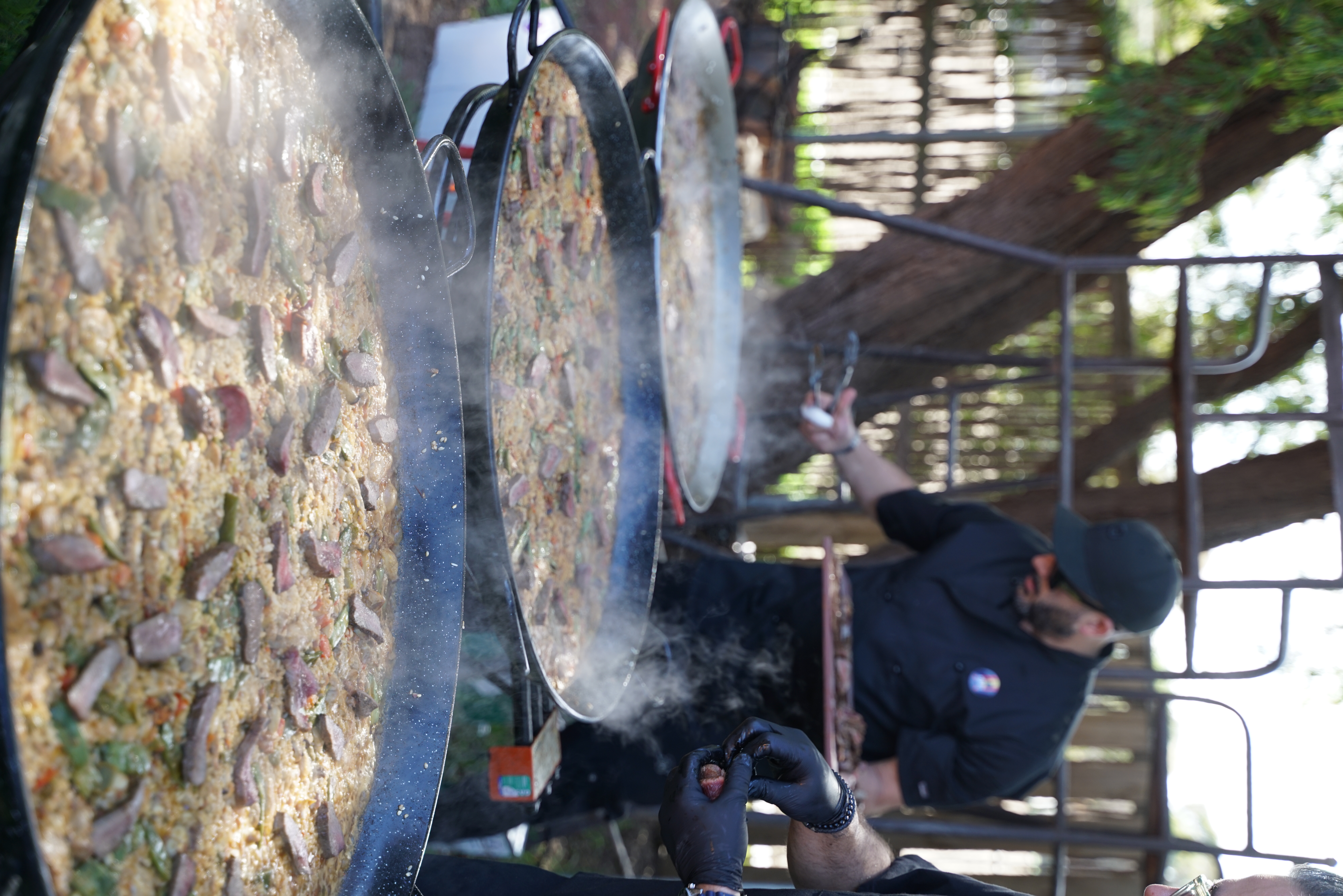 Tapas Madriz chef cooking live paella at a Melbourne wedding